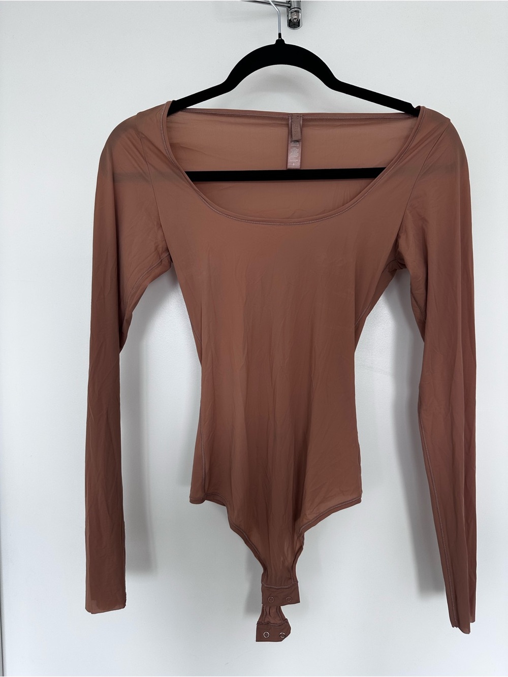 SKIMS Long Sleeve Scoop Neck Bodysuit in Brown Tan